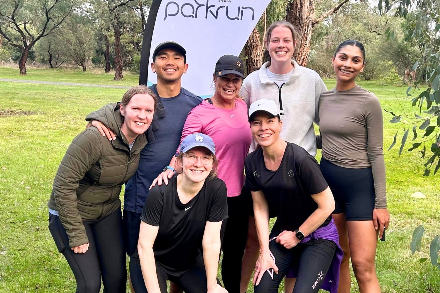 A small group of IRS staff posing for a photo after their participation in parkrun