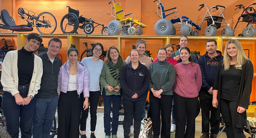 IRS Physiotherapists at Push Mobility's showroom posing for a group shot
